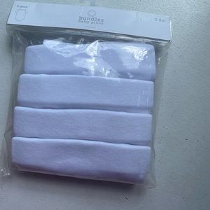 8 white onesies (0-3 m / 3-6m)